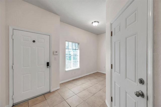 113 S Sherrill St Unit 113, Tampa, FL 33609 - foyer entrance with baseboards and light tile patterned floors