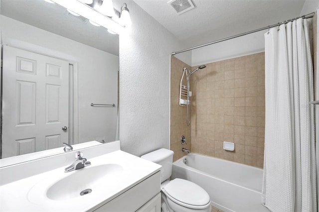 113 S Sherrill St Unit 113, Tampa, FL 33609 - bathroom featuring toilet, a textured wall, shower / bathtub combination with curtain, and vanity