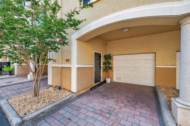 113 S Sherrill St Unit 113, Tampa, FL 33609 - doorway to property with stucco siding