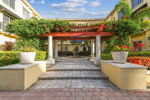 113 S Sherrill St Unit 113, Tampa, FL 33609 - view of property's community with a pergola