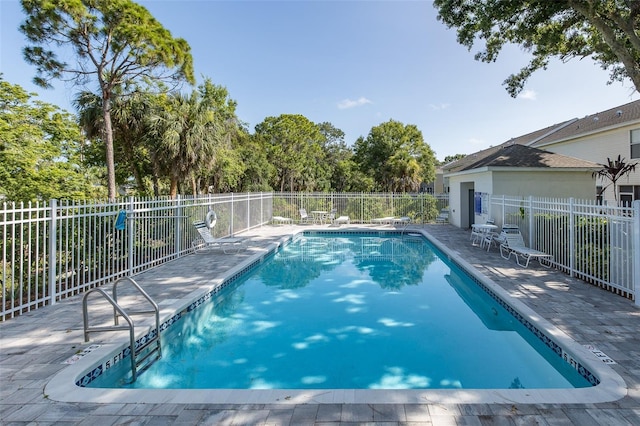 13521 Forest Lake Dr, Largo, FL 33771 - community pool with a patio
