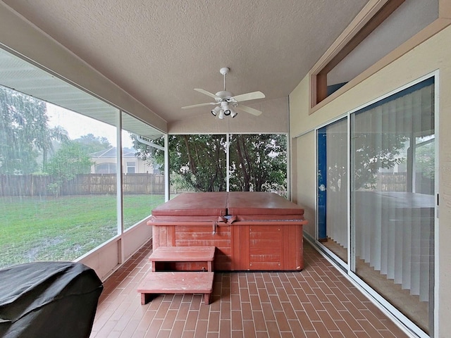 13094 Huntington Woods Ave, Spring Hill, FL 34609 - sunroom / solarium with a hot tub, ceiling fan, healthy amount of natural light, and vaulted ceiling