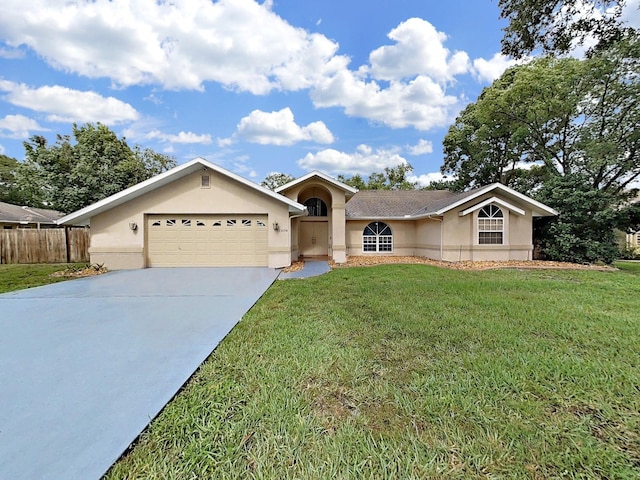 13094 Huntington Woods Ave, Spring Hill, FL 34609 - ranch-style home with stucco siding, a garage, and driveway