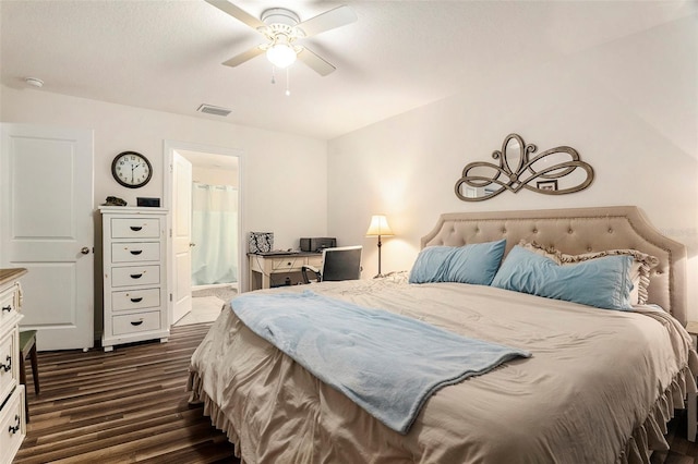 7639 Broad Pointe Dr, Zephyrhills, FL 33540 - bedroom with dark wood finished floors, ensuite bathroom, and ceiling fan