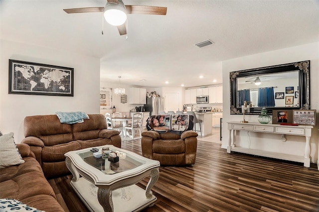 7639 Broad Pointe Dr, Zephyrhills, FL 33540 - living room featuring ceiling fan, wood finished floors, and recessed lighting