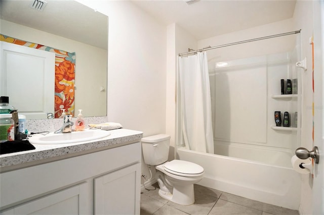 7639 Broad Pointe Dr, Zephyrhills, FL 33540 - full bathroom featuring tile patterned floors, vanity, and shower / bath combo
