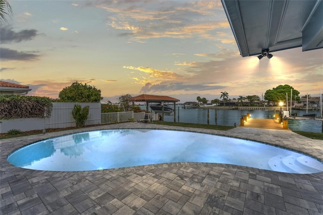 319 Midway Is, Clearwater Beach, FL 33767 - view of pool featuring boat lift, a dock, and a water view