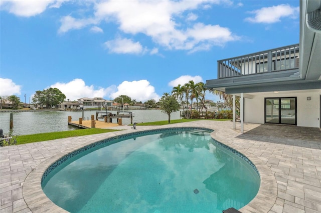 319 Midway Is, Clearwater Beach, FL 33767 - outdoor pool featuring a patio area, a dock, and a water view