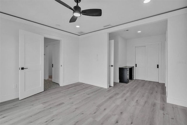 319 Midway Is, Clearwater Beach, FL 33767 - empty room featuring a ceiling fan, light wood-style floors, recessed lighting, and baseboards