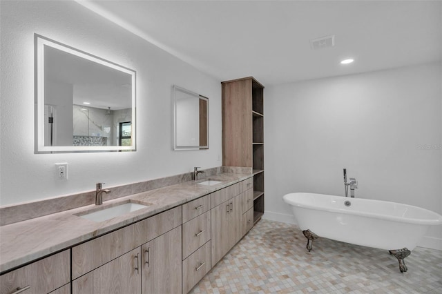 319 Midway Is, Clearwater Beach, FL 33767 - full bathroom with a freestanding bath, double vanity, and a shower