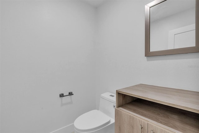 319 Midway Is, Clearwater Beach, FL 33767 - half bathroom featuring toilet and baseboards