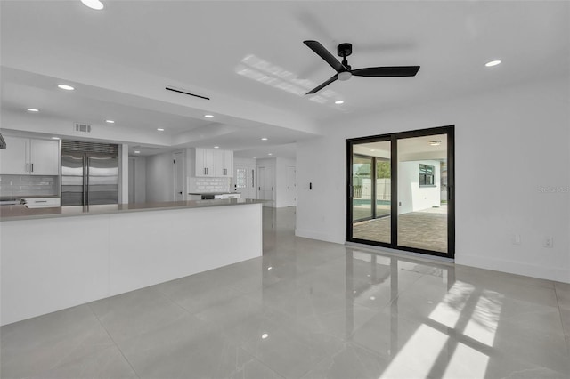 319 Midway Is, Clearwater Beach, FL 33767 - unfurnished living room featuring recessed lighting, a ceiling fan, baseboards, and light tile patterned flooring