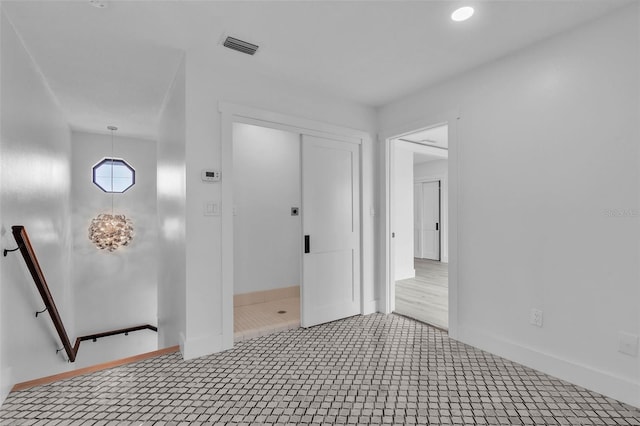 319 Midway Is, Clearwater Beach, FL 33767 - hallway featuring an upstairs landing and baseboards