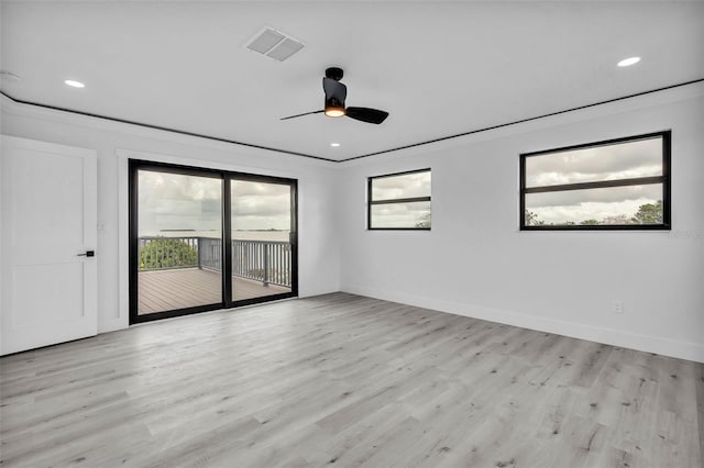 319 Midway Is, Clearwater Beach, FL 33767 - empty room featuring light wood-style flooring, ceiling fan, recessed lighting, and baseboards