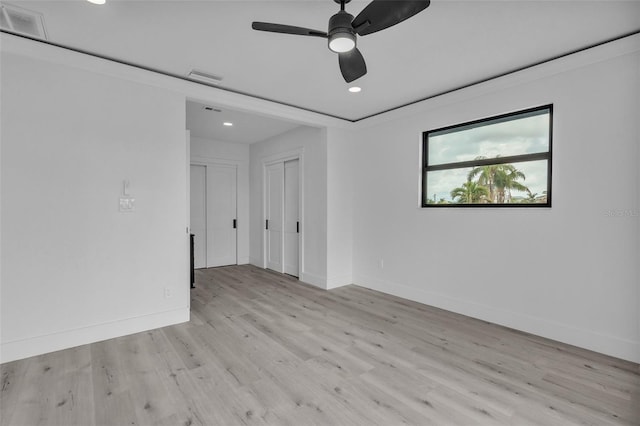 319 Midway Is, Clearwater Beach, FL 33767 - unfurnished room featuring light wood-style floors, baseboards, recessed lighting, and ceiling fan