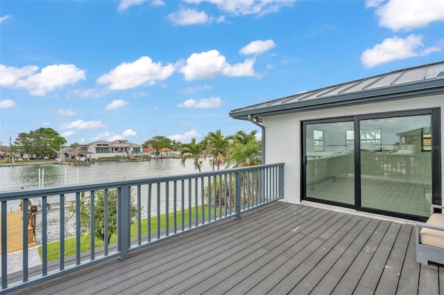 319 Midway Is, Clearwater Beach, FL 33767 - wooden deck with a water view