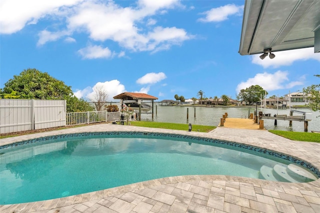 319 Midway Is, Clearwater Beach, FL 33767 - outdoor pool with boat lift, a boat dock, and a water view