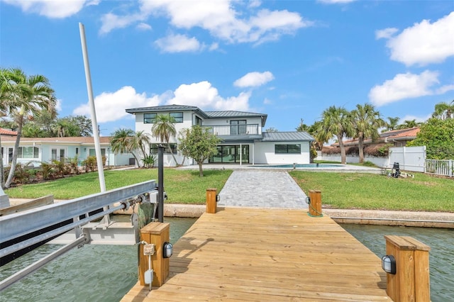 319 Midway Is, Clearwater Beach, FL 33767 - dock area featuring a balcony, a pool, a patio area, and a water view