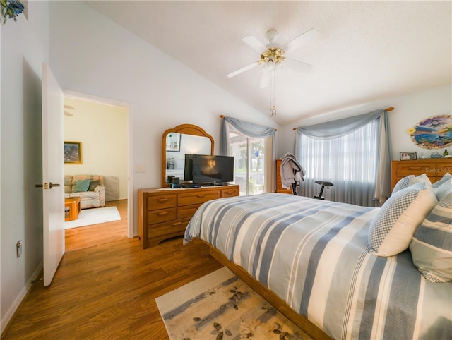 39650 US Highway 19 N, Tarpon Springs, FL 34689 - bedroom featuring light wood-style floors, vaulted ceiling, and ceiling fan