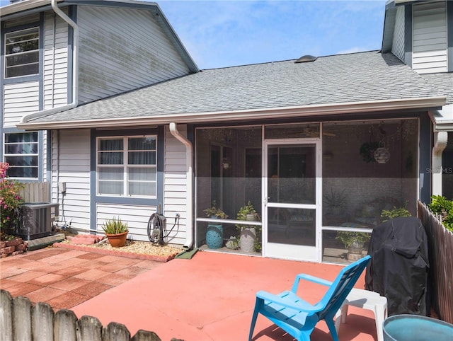 39650 US Highway 19 N, Tarpon Springs, FL 34689 - view of patio with central AC, a sunroom, and grilling area