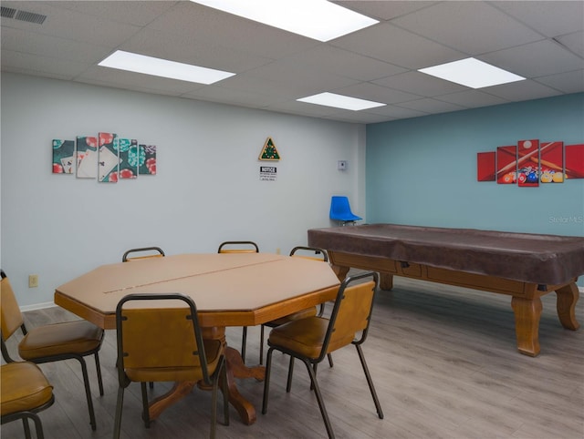 39650 US Highway 19 N, Tarpon Springs, FL 34689 - playroom with light wood finished floors, a paneled ceiling, baseboards, and pool table