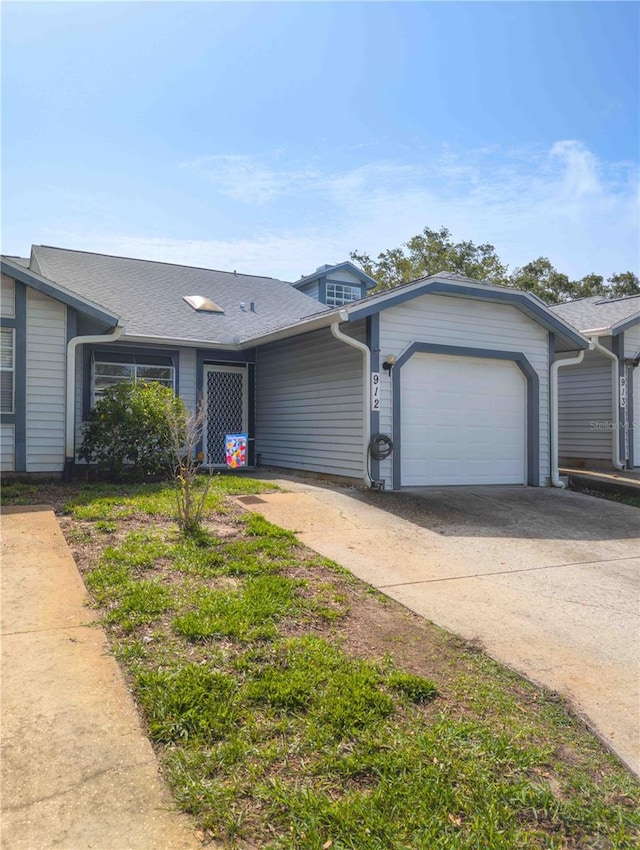 39650 US Highway 19 N, Tarpon Springs, FL 34689 - view of front of home with concrete driveway and a garage