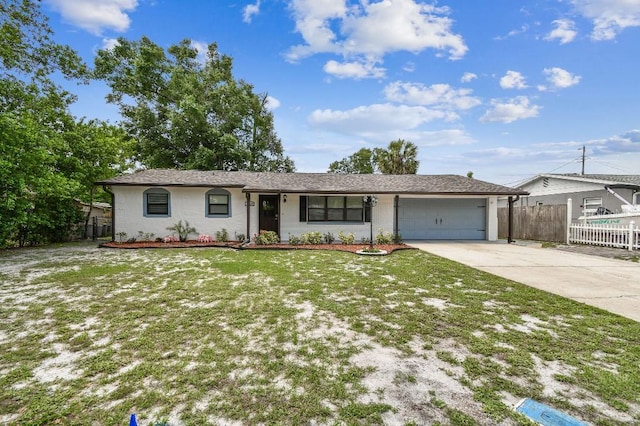 229 Temple Ave, Fern Park, FL 32730 - ranch-style home featuring a garage, driveway, and stucco siding