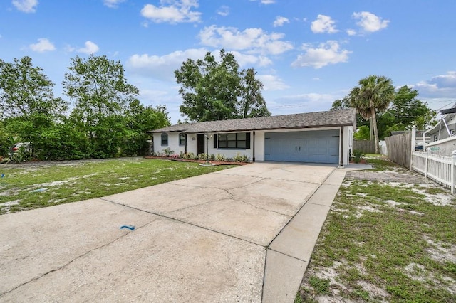 229 Temple Ave, Fern Park, FL 32730 - ranch-style home with an attached garage, concrete driveway, and stucco siding