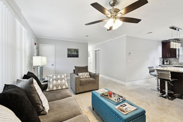 229 Temple Ave, Fern Park, FL 32730 - living room with a ceiling fan, light tile patterned flooring, and baseboards
