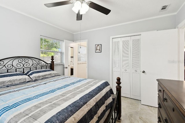 229 Temple Ave, Fern Park, FL 32730 - bedroom with ornamental molding, a closet, and ceiling fan