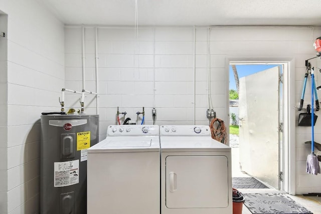229 Temple Ave, Fern Park, FL 32730 - laundry room with electric water heater and independent washer and dryer
