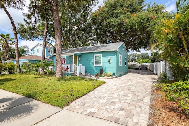 2709 Upton St S, Gulfport, FL 33711 - view of front of home with decorative driveway and roof with shingles