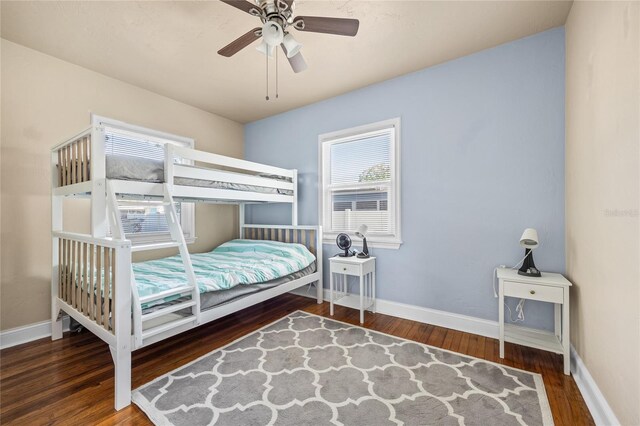 2709 Upton St S, Gulfport, FL 33711 - bedroom featuring wood finished floors, baseboards, and a ceiling fan