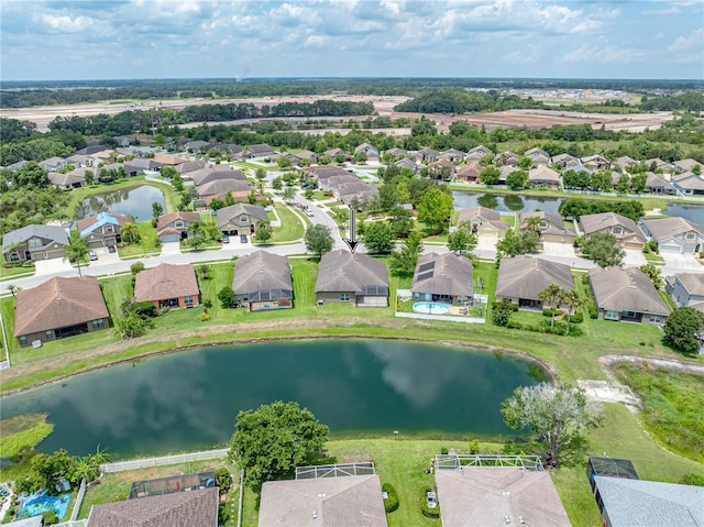 6957 Boulder Run Loop, Wesley Chapel, FL 33545 - aerial perspective of suburban area with a large body of water