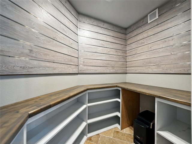 6957 Boulder Run Loop, Wesley Chapel, FL 33545 - sauna / steam room with stone finish flooring and wood walls