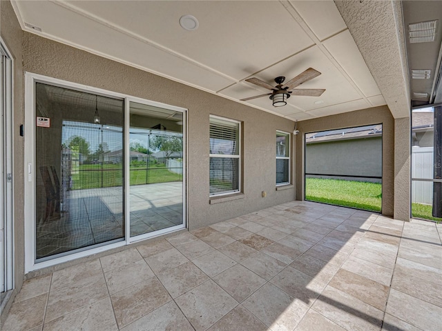 6957 Boulder Run Loop, Wesley Chapel, FL 33545 - unfurnished sunroom featuring healthy amount of natural light