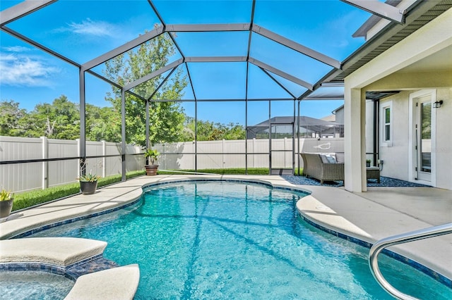 18696 Malinche Loop, Spring Hill, FL 34610 - view of swimming pool featuring a patio area, a fenced backyard, and glass enclosure
