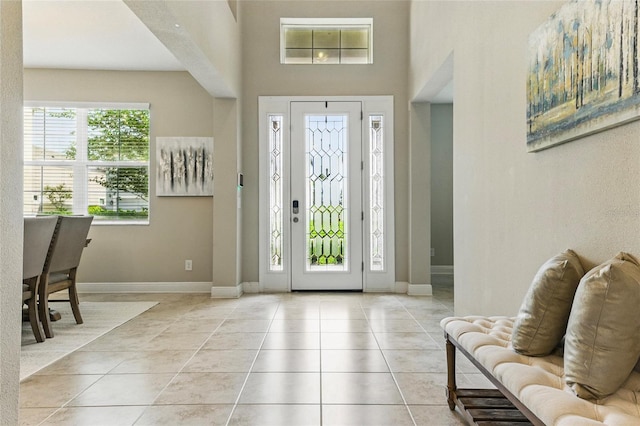 18696 Malinche Loop, Spring Hill, FL 34610 - entryway featuring tile patterned flooring and baseboards