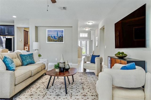 18696 Malinche Loop, Spring Hill, FL 34610 - living room featuring baseboards and ceiling fan