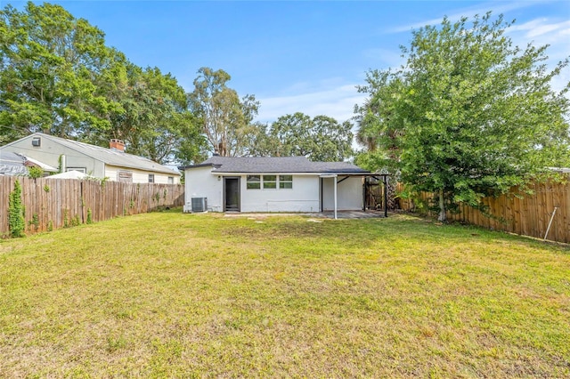 5622 Tangerine Ave S, Gulfport, FL 33707 - rear view of house with central AC unit