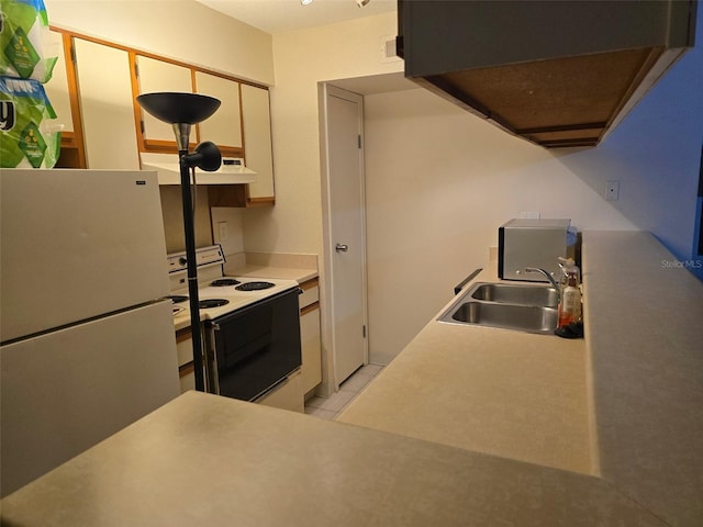 9100 Mlk St N Unit 503, Saint Petersburg, FL 33702 - kitchen featuring freestanding refrigerator, electric range, a sink, premium range hood, and exhaust hood