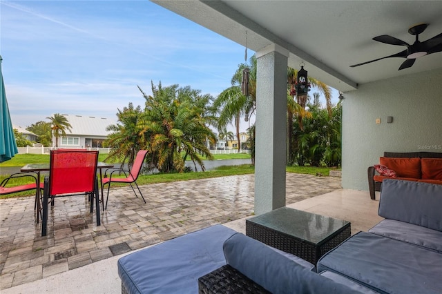 6416 Grenada Island Ave, Apollo Beach, FL 33572 - view of patio / terrace with ceiling fan, outdoor dining area, and an outdoor living space