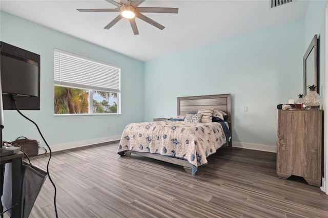 6416 Grenada Island Ave, Apollo Beach, FL 33572 - bedroom with baseboards, wood finished floors, and ceiling fan