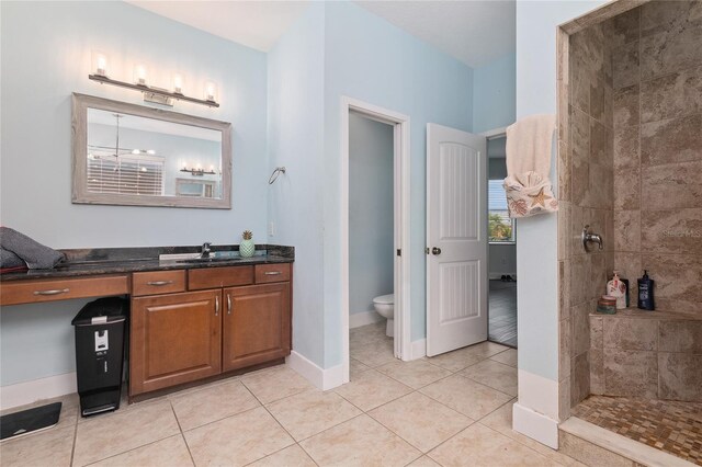 6416 Grenada Island Ave, Apollo Beach, FL 33572 - full bath with a walk in shower, vanity, tile patterned flooring, toilet, and baseboards