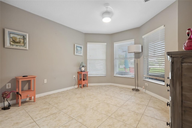 6416 Grenada Island Ave, Apollo Beach, FL 33572 - tiled empty room featuring baseboards