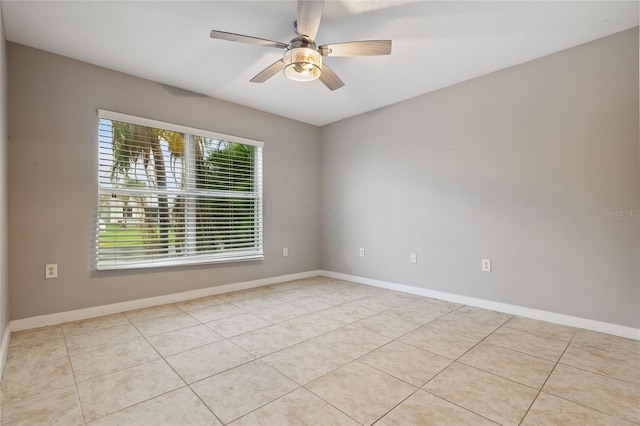 6416 Grenada Island Ave, Apollo Beach, FL 33572 - spare room featuring baseboards, ceiling fan, and tile patterned floors