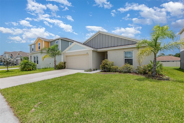1368 Axel Cir, Winter Haven, FL 33880 - view of front of home featuring concrete driveway, an attached garage, board and batten siding, a front yard, and stucco siding