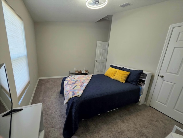 1368 Axel Cir, Winter Haven, FL 33880 - carpeted bedroom featuring multiple windows