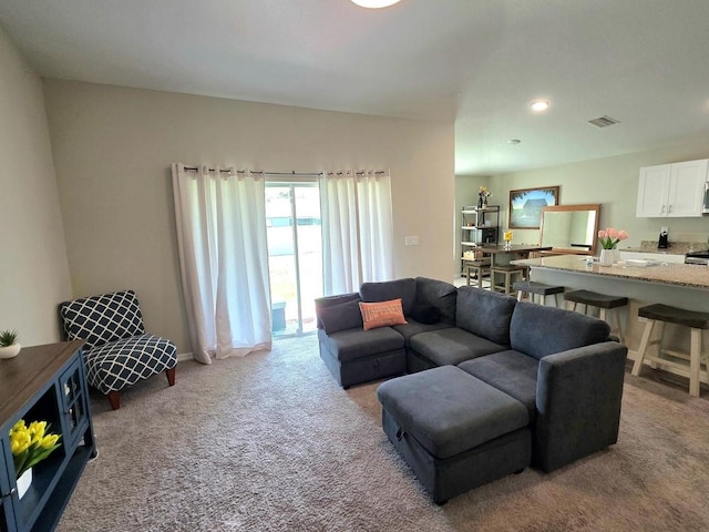 1368 Axel Cir, Winter Haven, FL 33880 - carpeted living room featuring recessed lighting