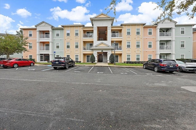 4998 Key Lime Dr Unit 103, Jacksonville, FL 32256 - view of apartment building / complex featuring uncovered parking